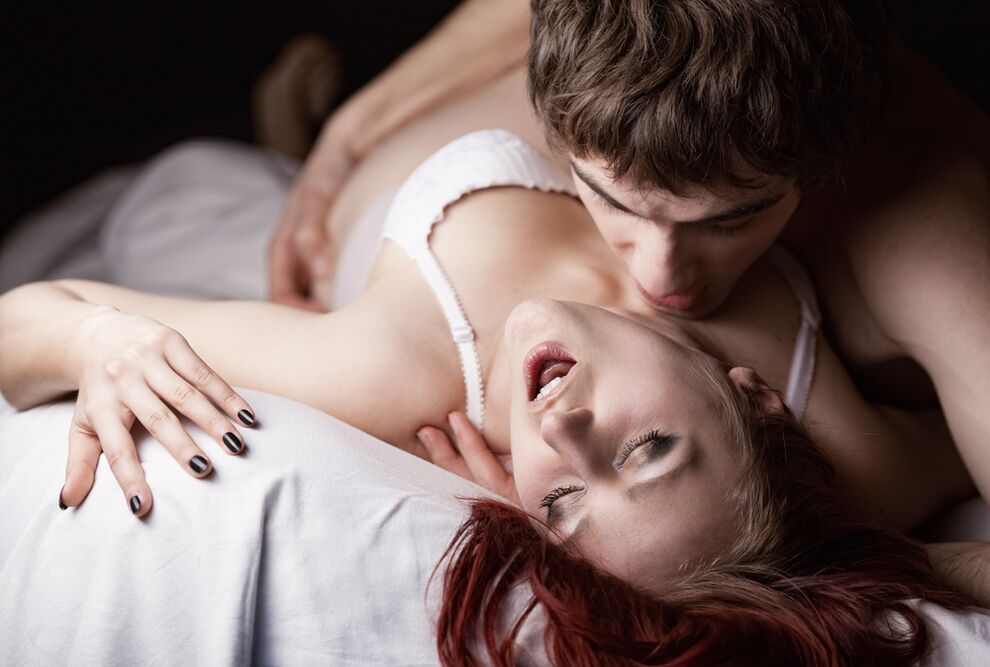 Excited man caresses woman